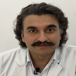 Dr Magan Mehrotra